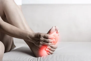 Close-up of painful foot with inflamed sole, common symptom in diabetic foot conditions